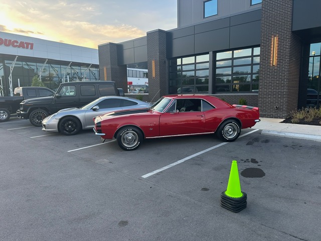 Classic Camaro at a dealership event